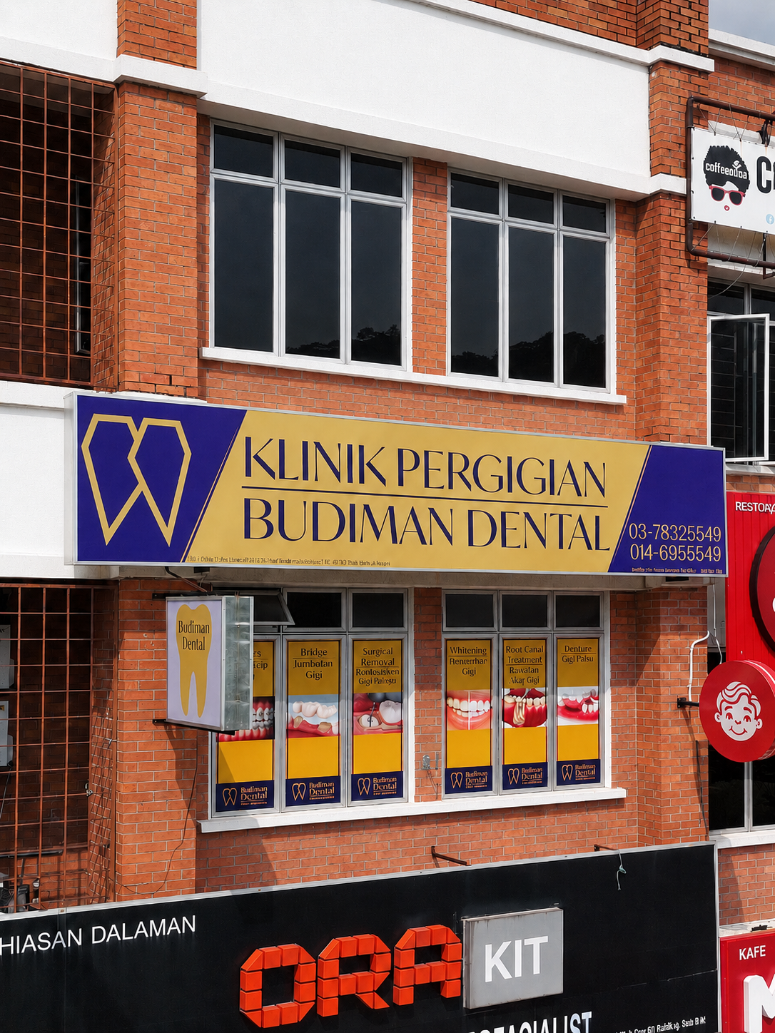 Papan tanda Klinik Pergigian Budiman Dental di Alam Budiman